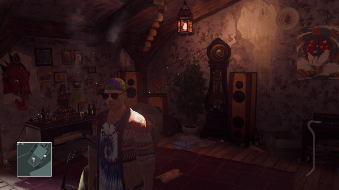 Agent 47 wearing sunglasses, a tie-dye T-shirt, a tie-dye bandana, and a hippieish cardigan