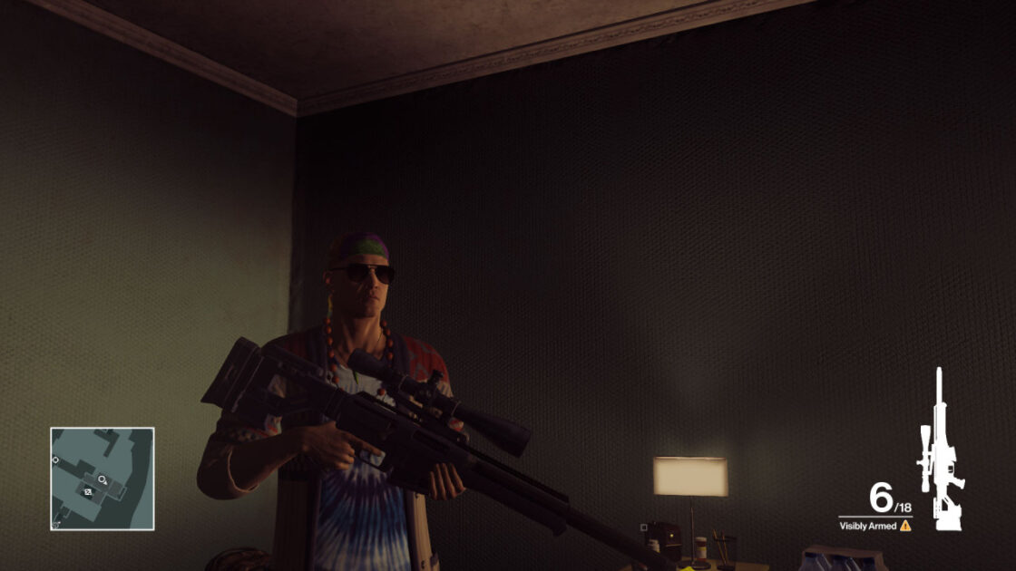 Agent 47, still in hippie garb, now wielding a sniper rifle